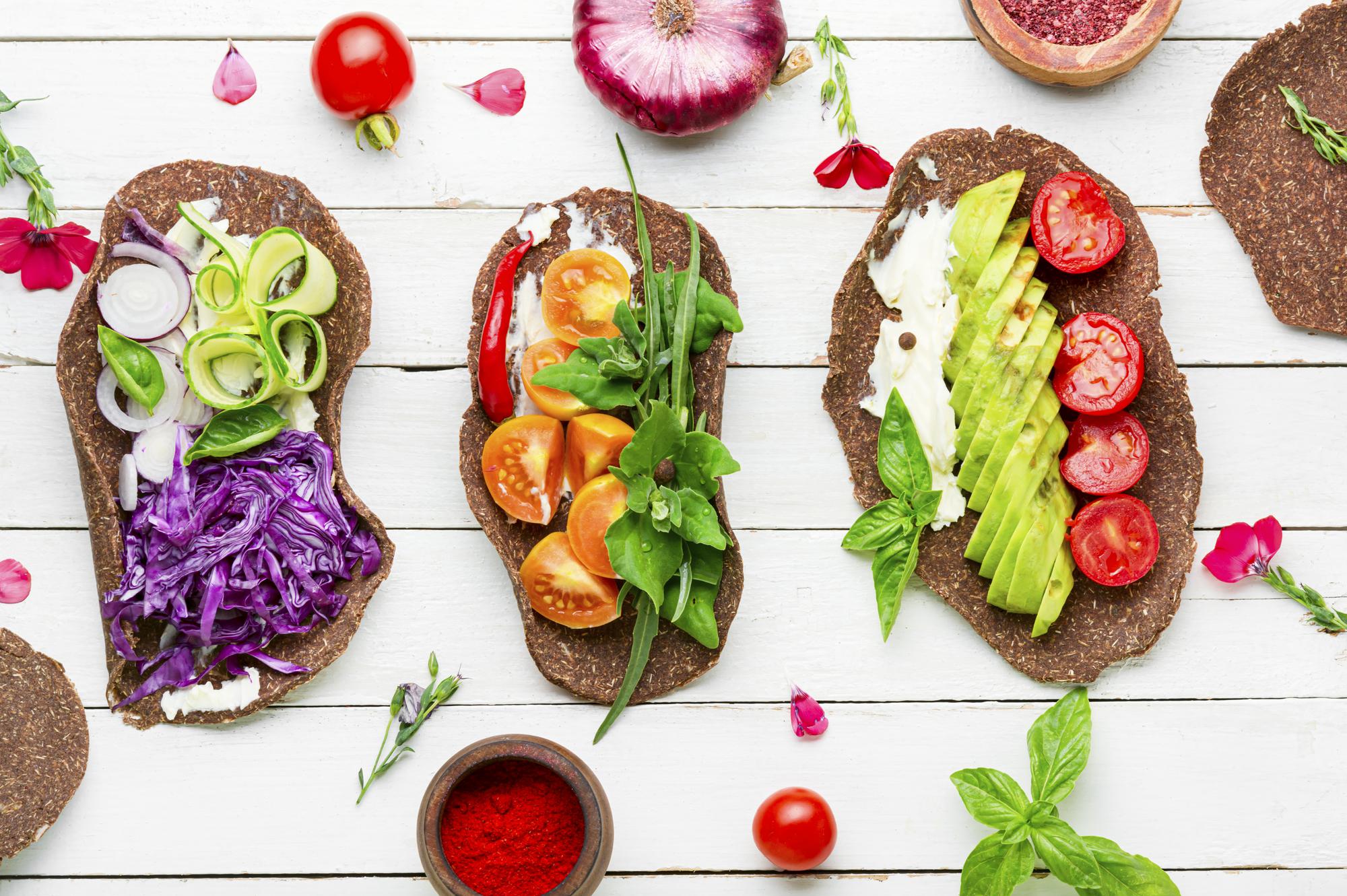 Editorial shot: plated sharing board with vibrant salads